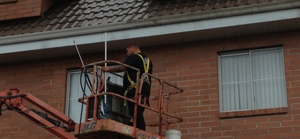 Aerial power washing